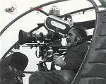 Charles Lagus filming from a helicopter