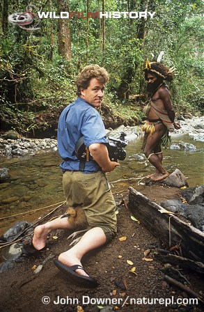 Martin Dohrn filming with cassowary chick and Huli tribesman