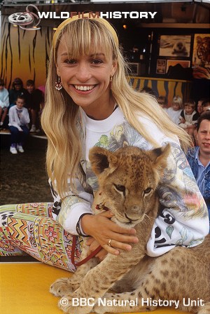 Michaela Strachan with a lion cub for The Really Wild Show