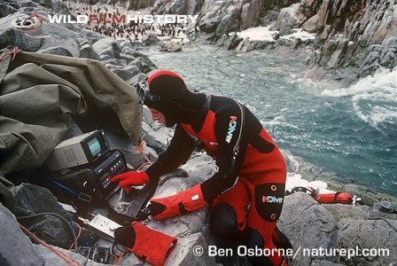 Monitoring a remote underwater camera (in water behind diver) for Life in the Freezer