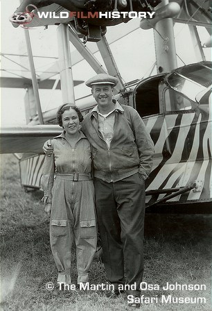 Martin and Osa Johnson by their plane Osa's Ark, used in filming