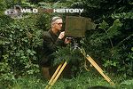 Eric Ashby filming with camera in home-made sound proofing case