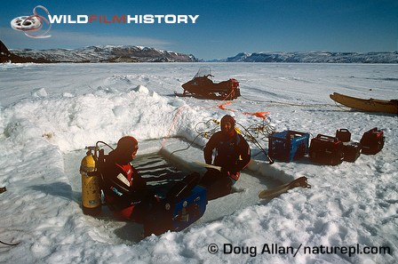 Doug Allan and underwater film crew preparing to dive beneath sea for Life in the Freezer