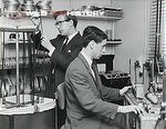 Barry Paine (left) assisting David Leonard in the cutting room