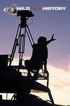 David Hughes filming from on top of his Land Rover