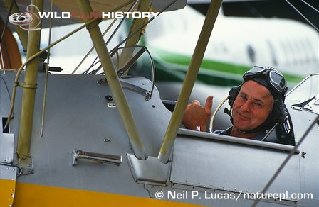 Mike Salisbury in tiger moth bi-plane during filming for The Private Life of Plants