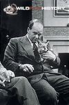 Peter Scott with a fox cub on the set of Look