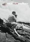 Peter Scott with camera, during filming for Faraway Look: Galapagos