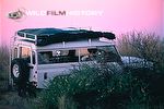 David and Carol Hughes filming from inside a modified Land Rover